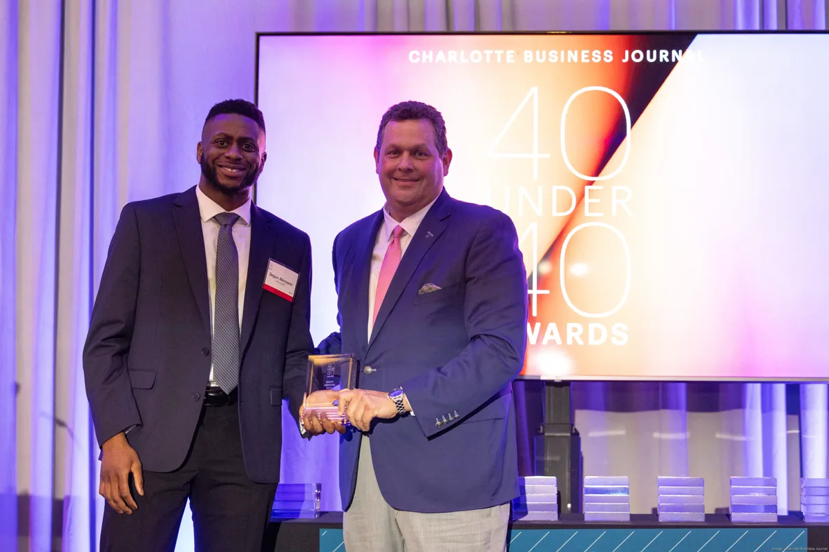 Receiving the Charlotte Business Journal 40 Under 40 award, May 2025