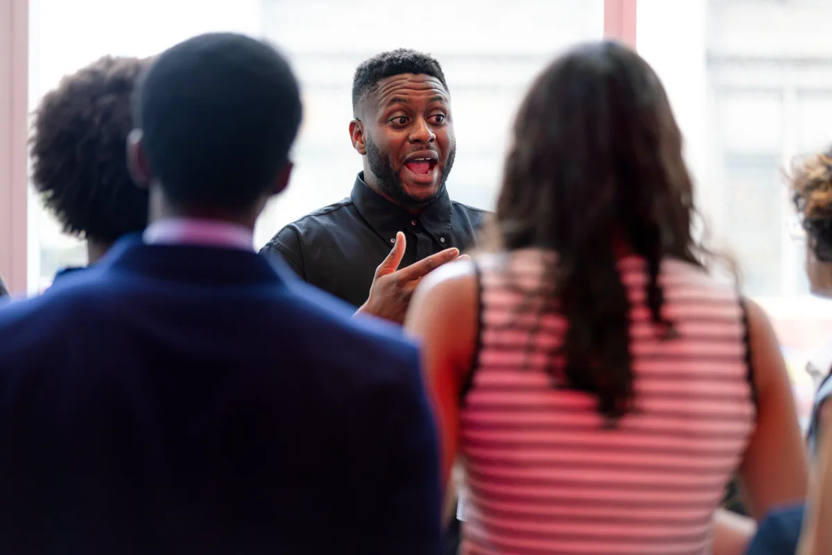 Making a point while networking with students at SEO TechDevCon in NYC, July 2026